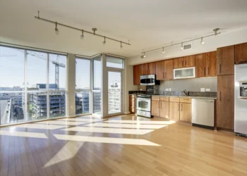 Empty apartment related to things to do before a new roommate moves in
