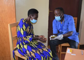 Community health worker promoting good health in developing communities