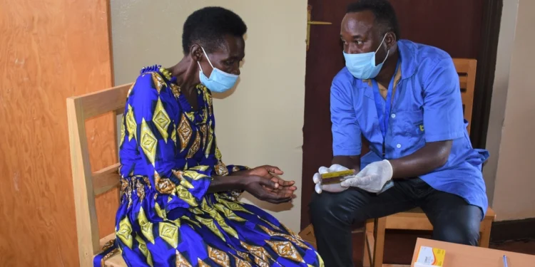 Community health worker promoting good health in developing communities