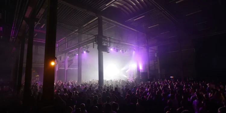 Concert crowd related to interview with Malik Crumpley