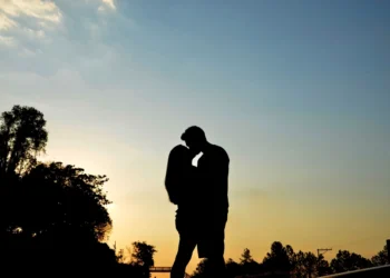 Couple in love together at sunset