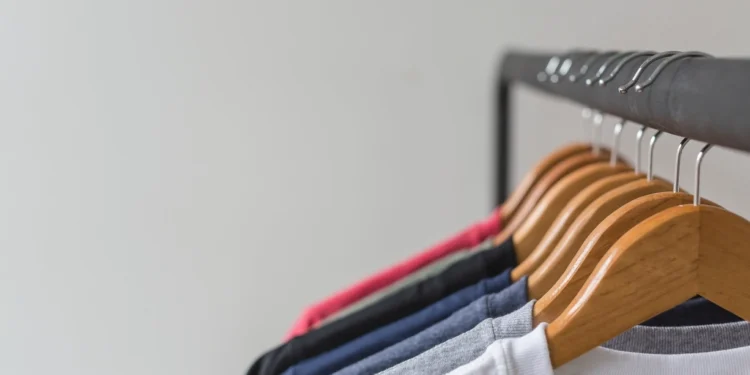 Plain t-shirts on hangers ready for custom printing