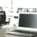 Laptop in office related to Outlook PST file risks and tips