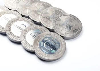 Cryptocurrency coins representing metaverse tokens like MoonLand