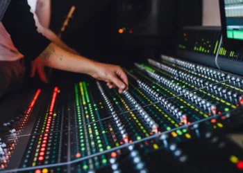Music producer working in a studio