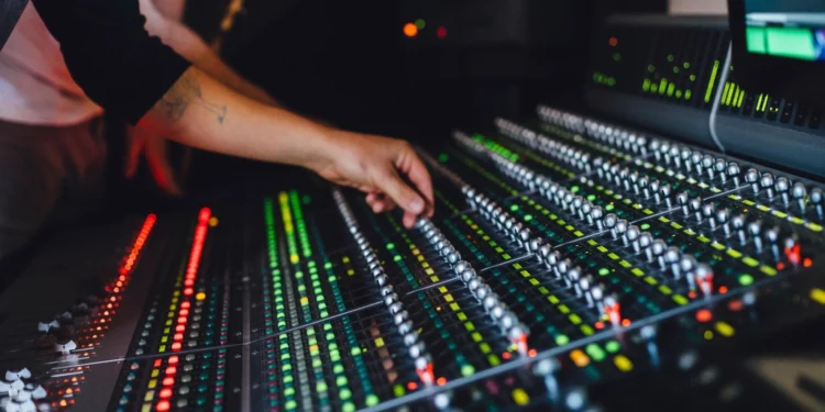 Music producer working in a studio