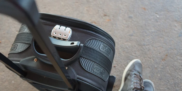 Travel suitcase packed for a student trip