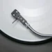 Vinyl record spinning on a turntable for a debut studio album release