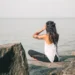 Woman sitting cross-legged and meditating