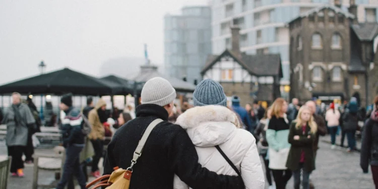 Couple walking together while traveling the world