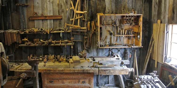 Well-equipped craftsman workshop with hand tools and workbench