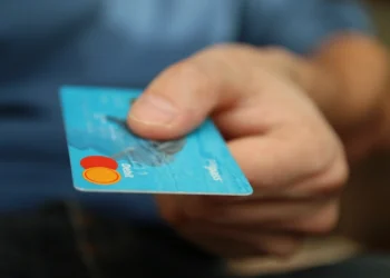 Credit card used for a secure event ticket payment