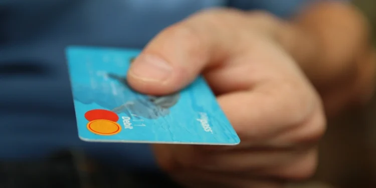 Credit card used for a secure event ticket payment