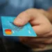 Credit card used for a secure event ticket payment
