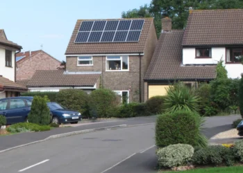 Solar panels installed on the roof of a house to cut electricity bills