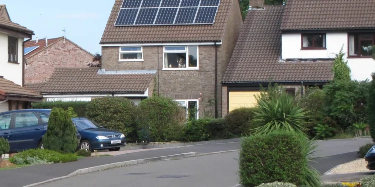 Solar panels installed on the roof of a house to cut electricity bills