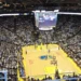 Basketball game inside a packed NBA arena